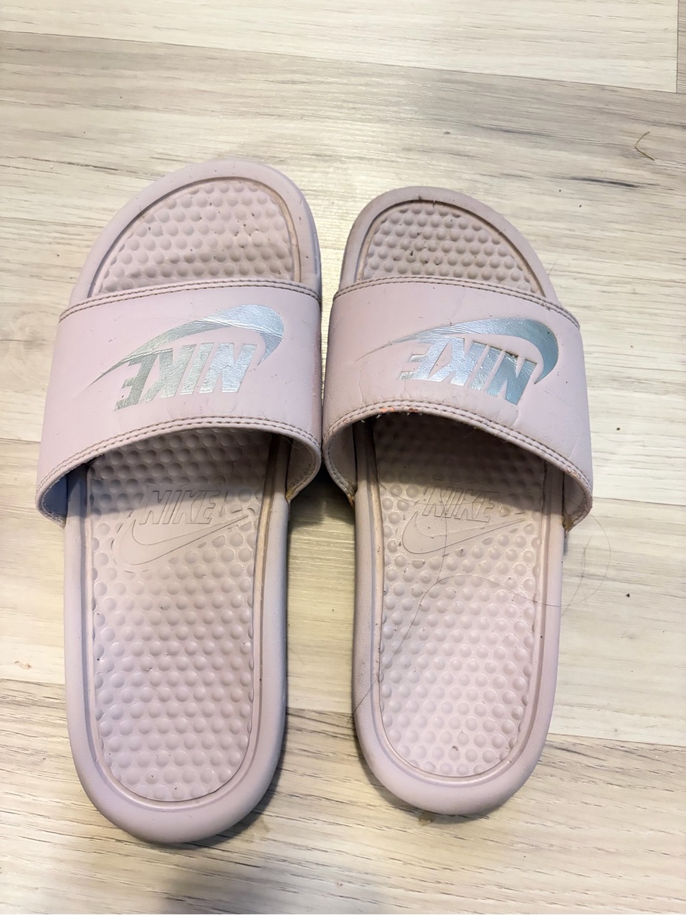 Nike Women's Light Pink Slide Sandals with Silver Logo